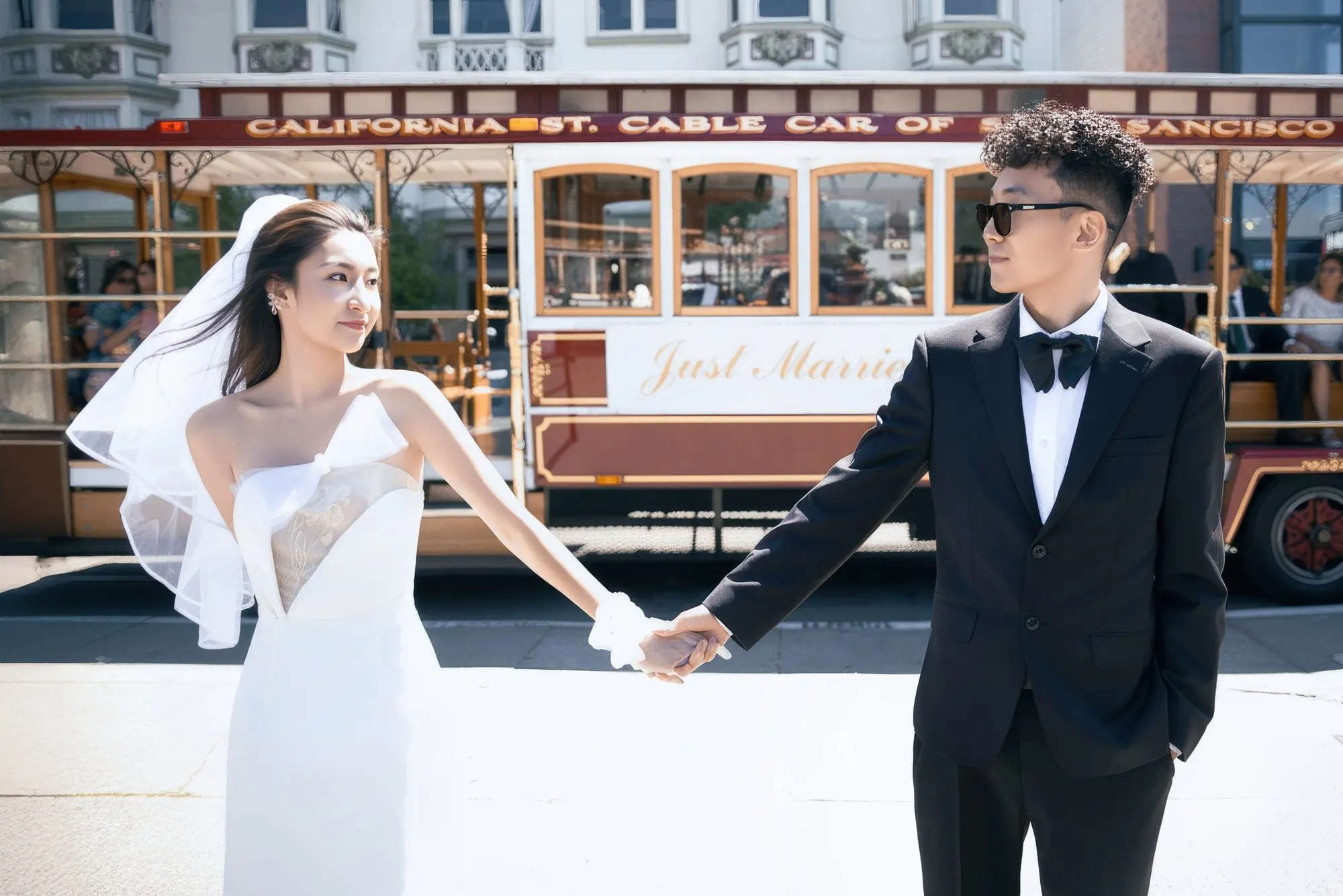 Couple on a San Francisco cable car, frame 10 of 11