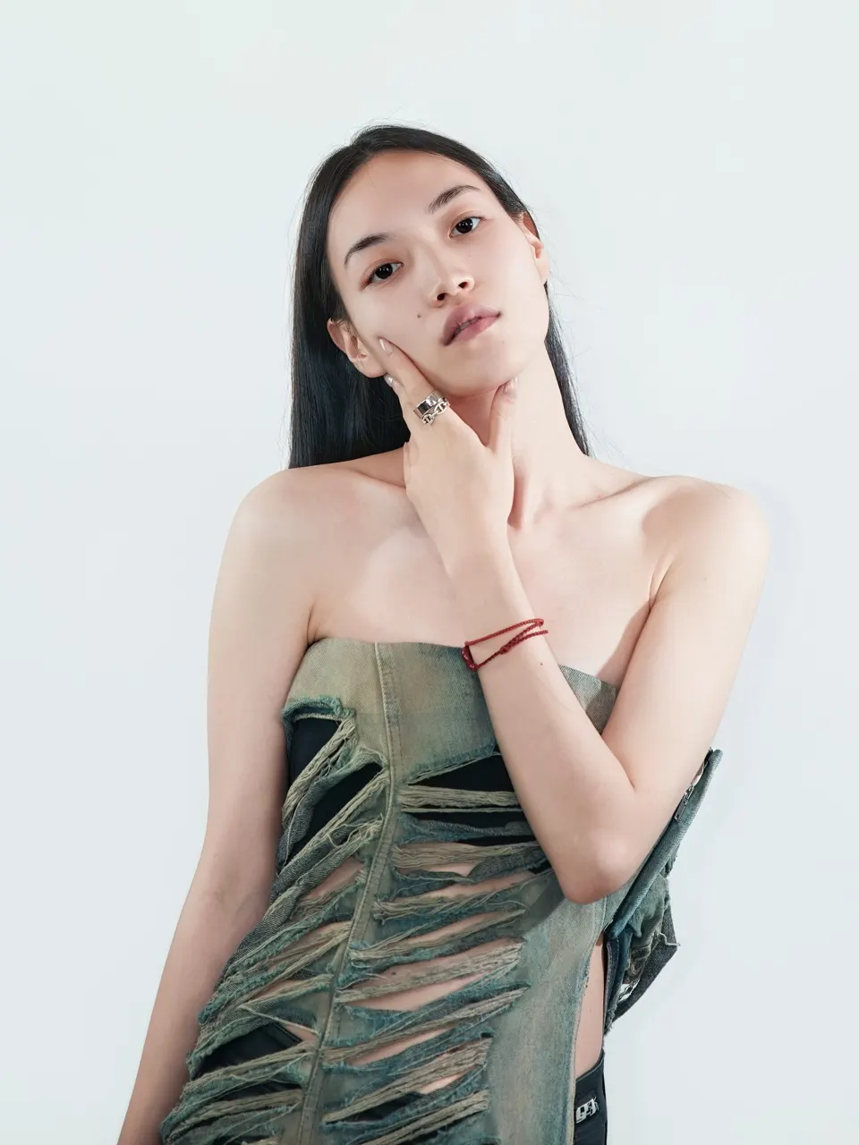 Fashion portrait in the studio, frame 14 of 17