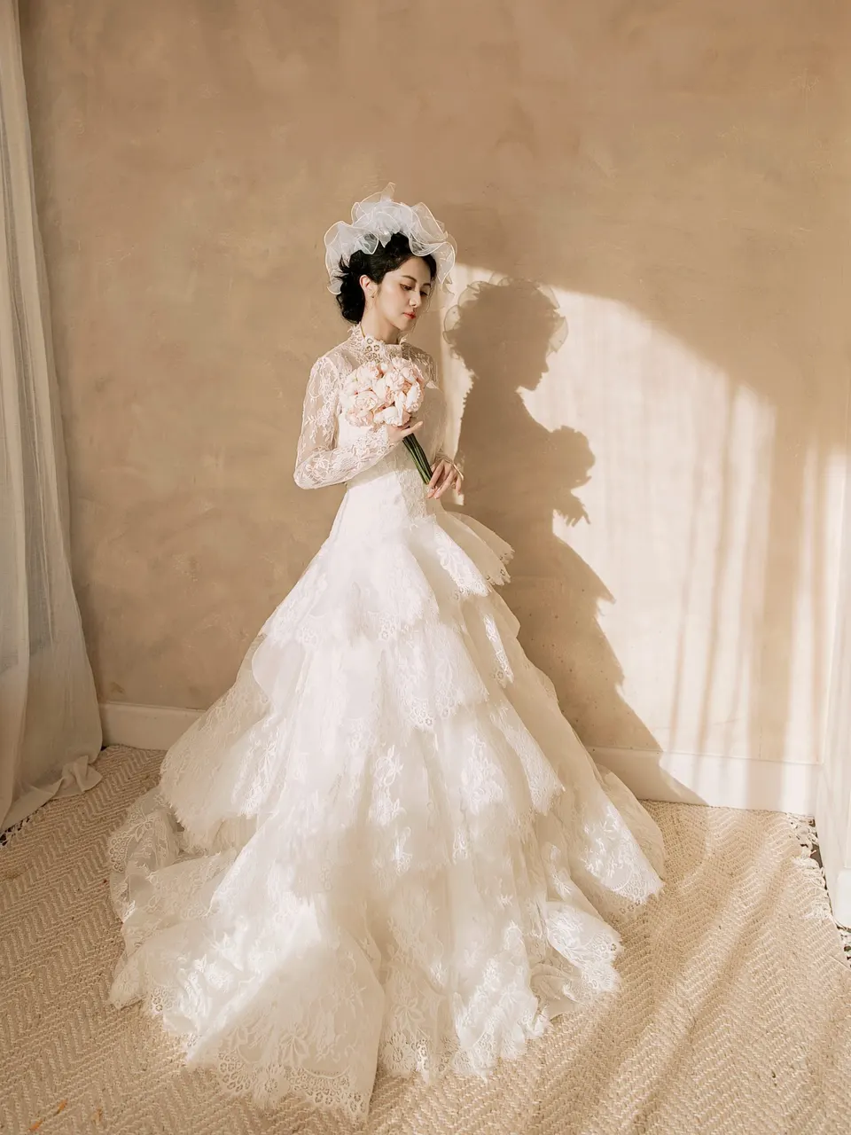 Vintage bridal portrait in a lace gown, frame 2 of 4