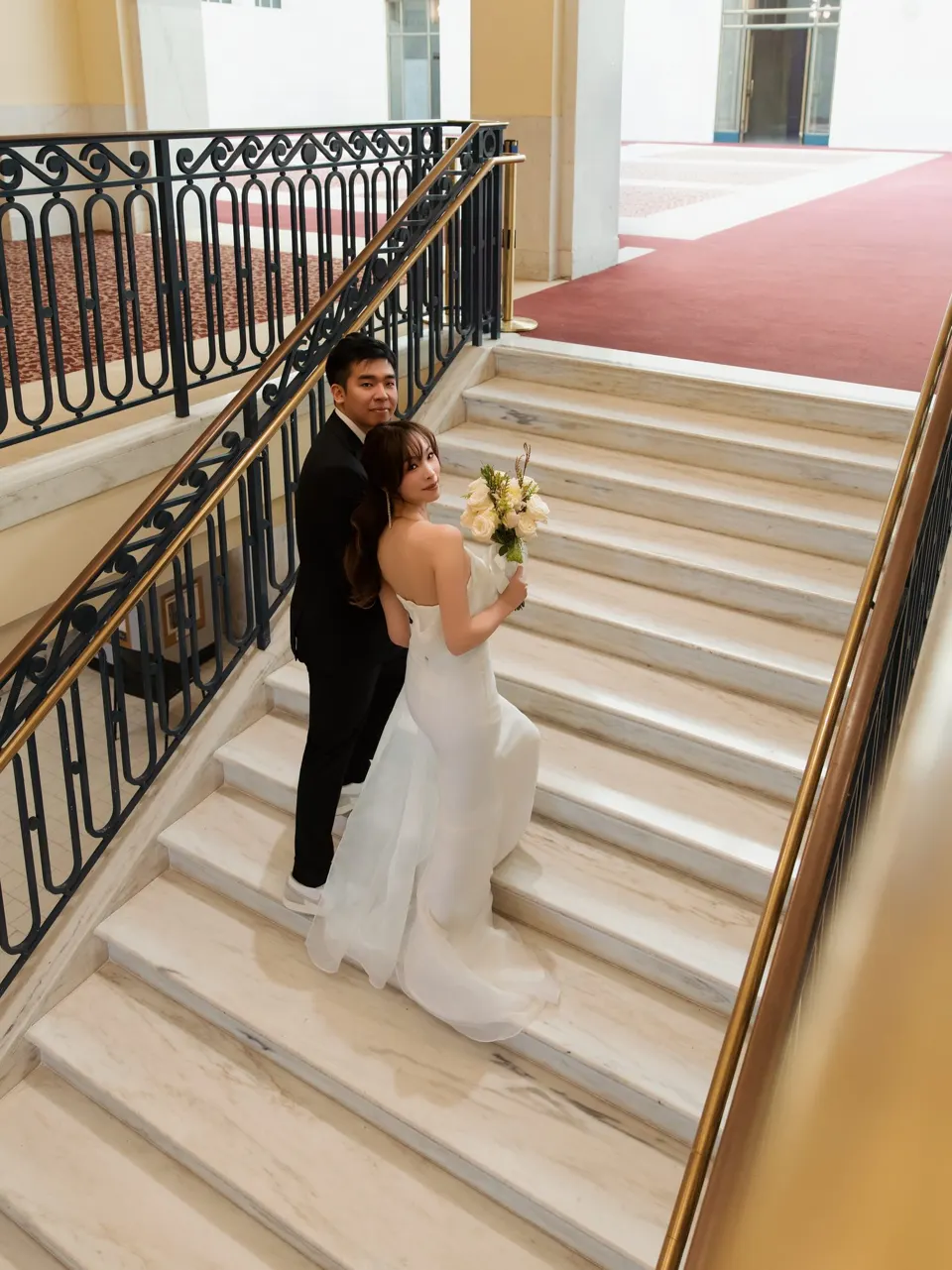 City Hall wedding on the grand staircase, frame 3 of 21