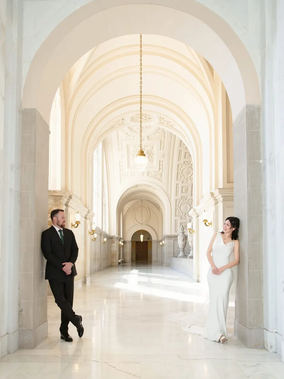City Hall wedding with calla lilies and a long lace veil, frame 15 of 25