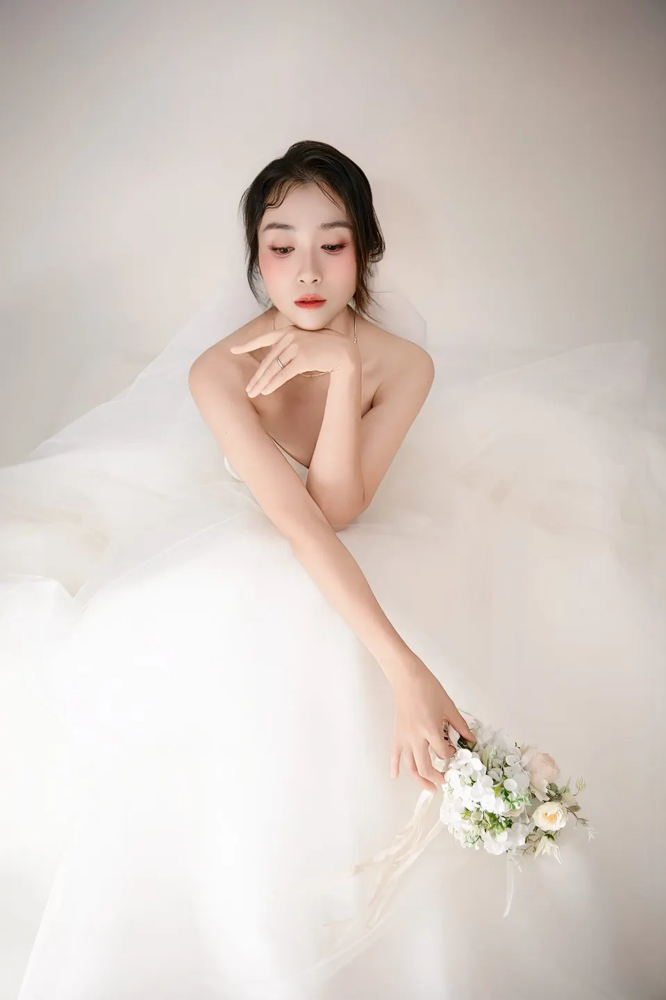 Bridal portrait in a tulle gown, frame 2 of 16