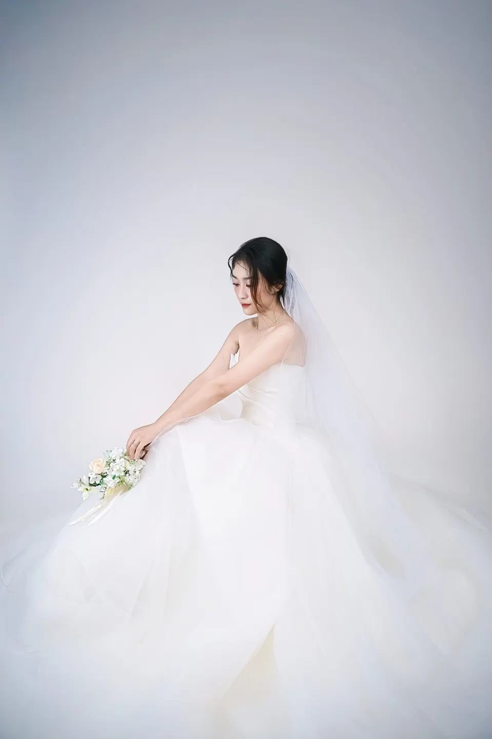 Bridal portrait in a tulle gown, frame 3 of 16