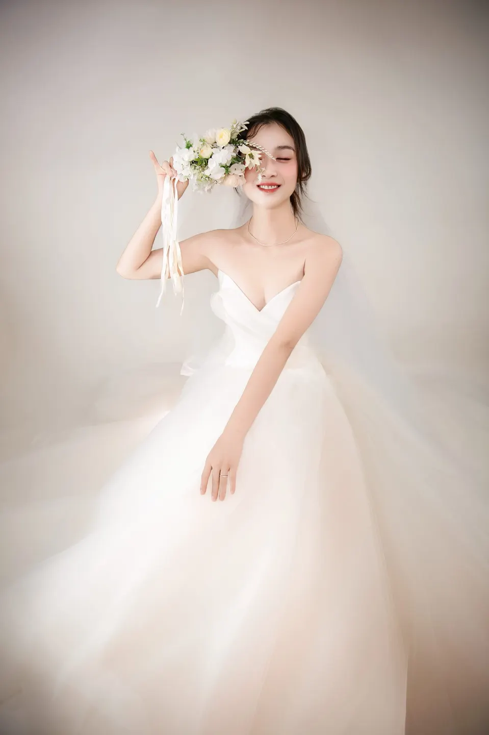 Bridal portrait in a tulle gown, frame 4 of 16