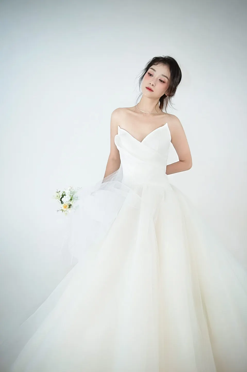 Bridal portrait in a tulle gown, frame 9 of 16