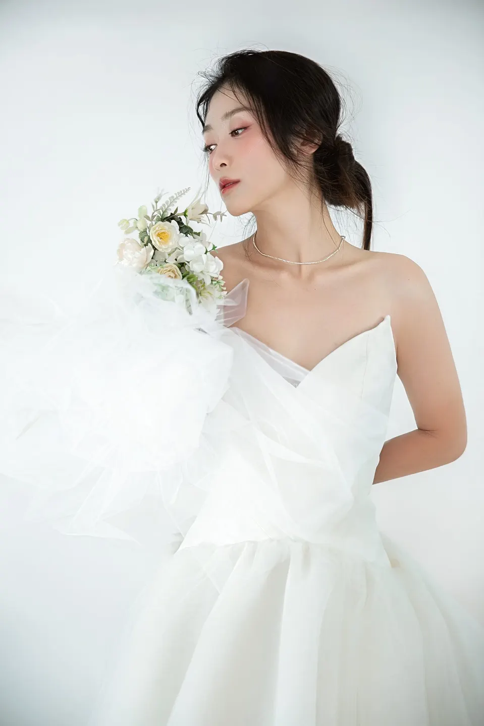Bridal portrait in a tulle gown, frame 10 of 16