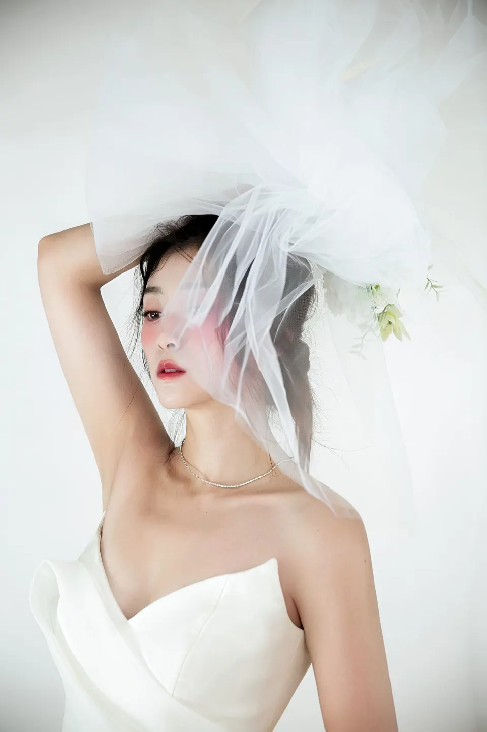Bridal portrait in a tulle gown, frame 11 of 16