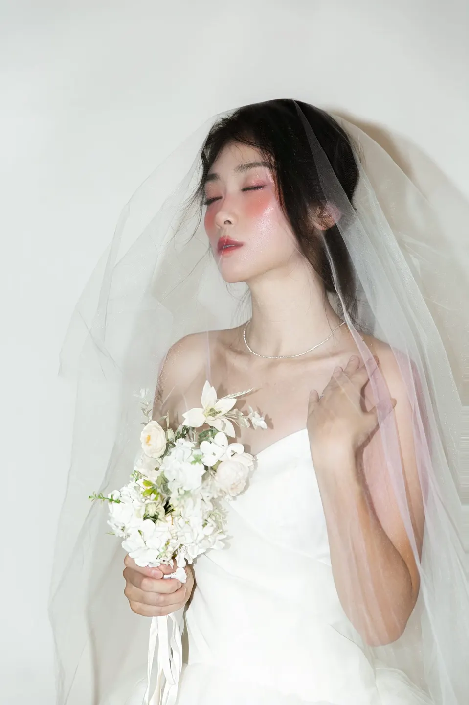 Bridal portrait in a tulle gown, frame 15 of 16