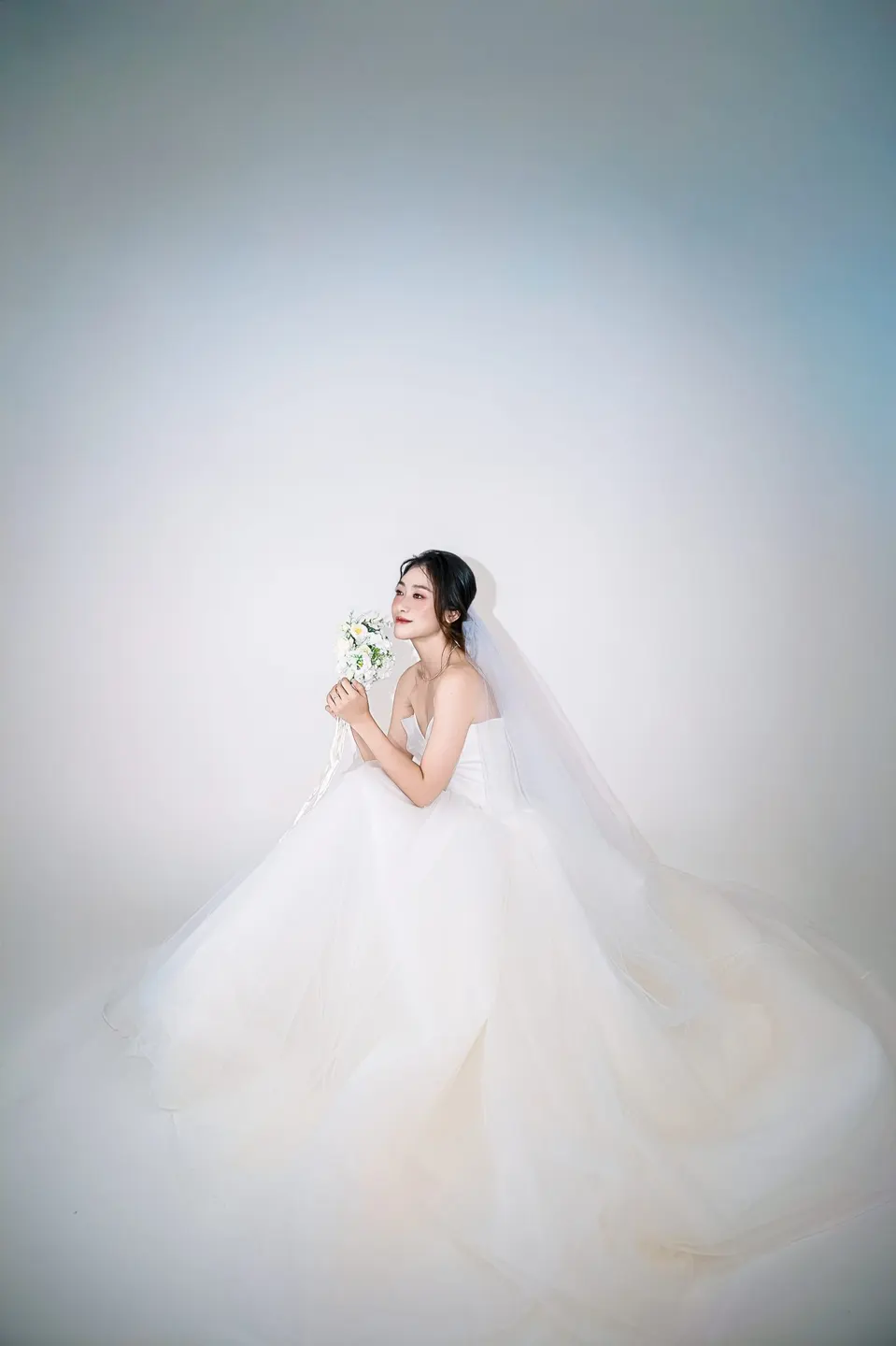 Bridal portrait in a tulle gown, frame 16 of 16
