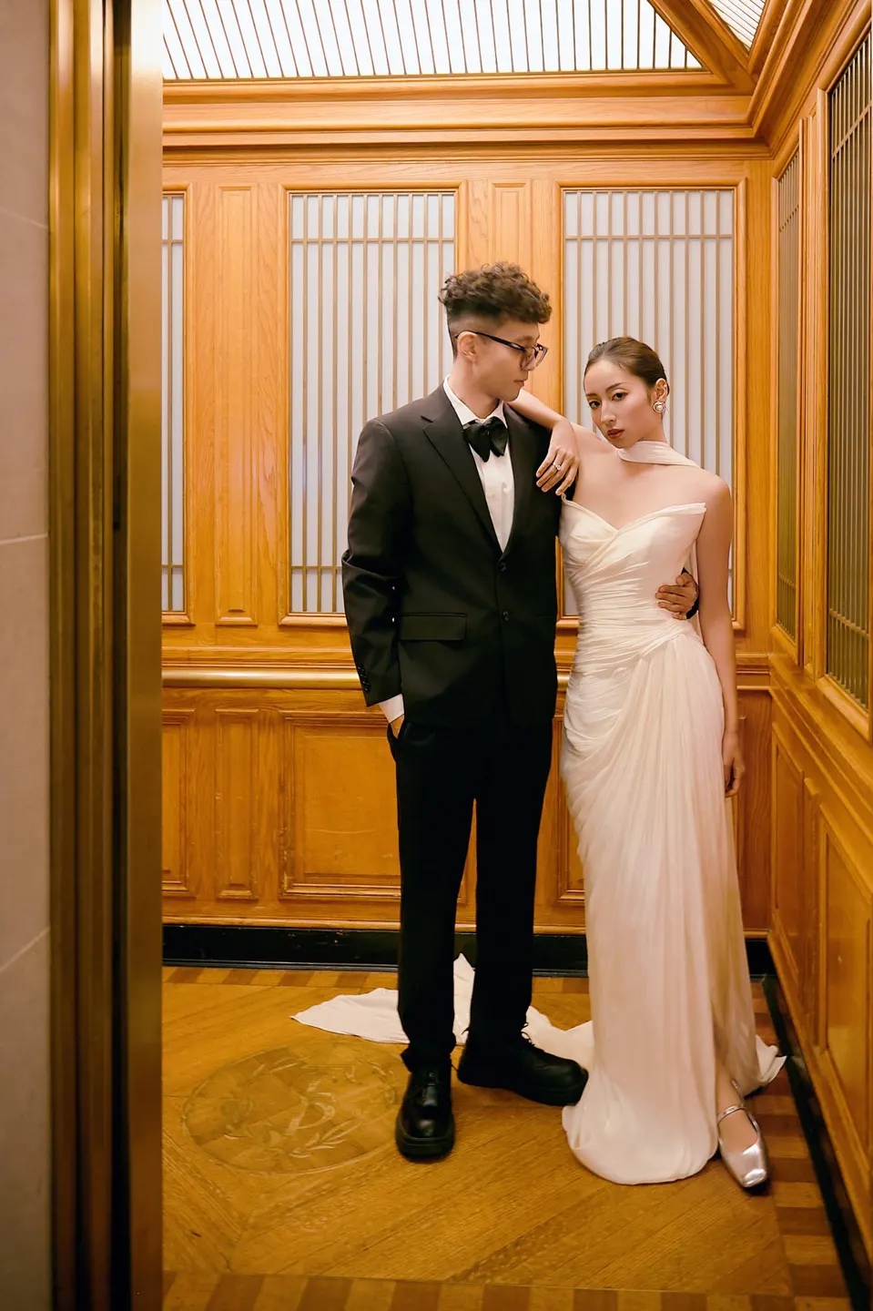 Bride in a bow-front gown at City Hall, frame 4 of 24