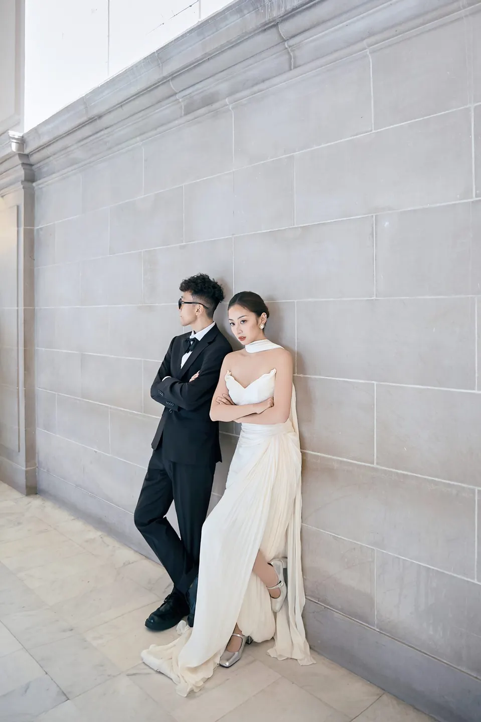 Bride in a bow-front gown at City Hall, frame 7 of 24