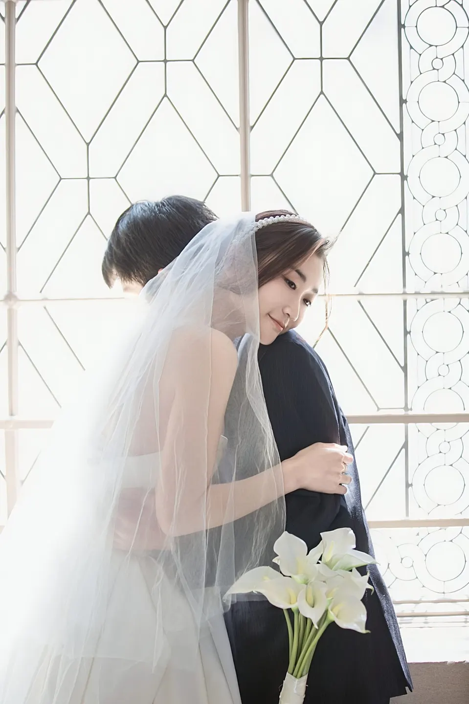 City Hall wedding in window light, frame 4 of 17