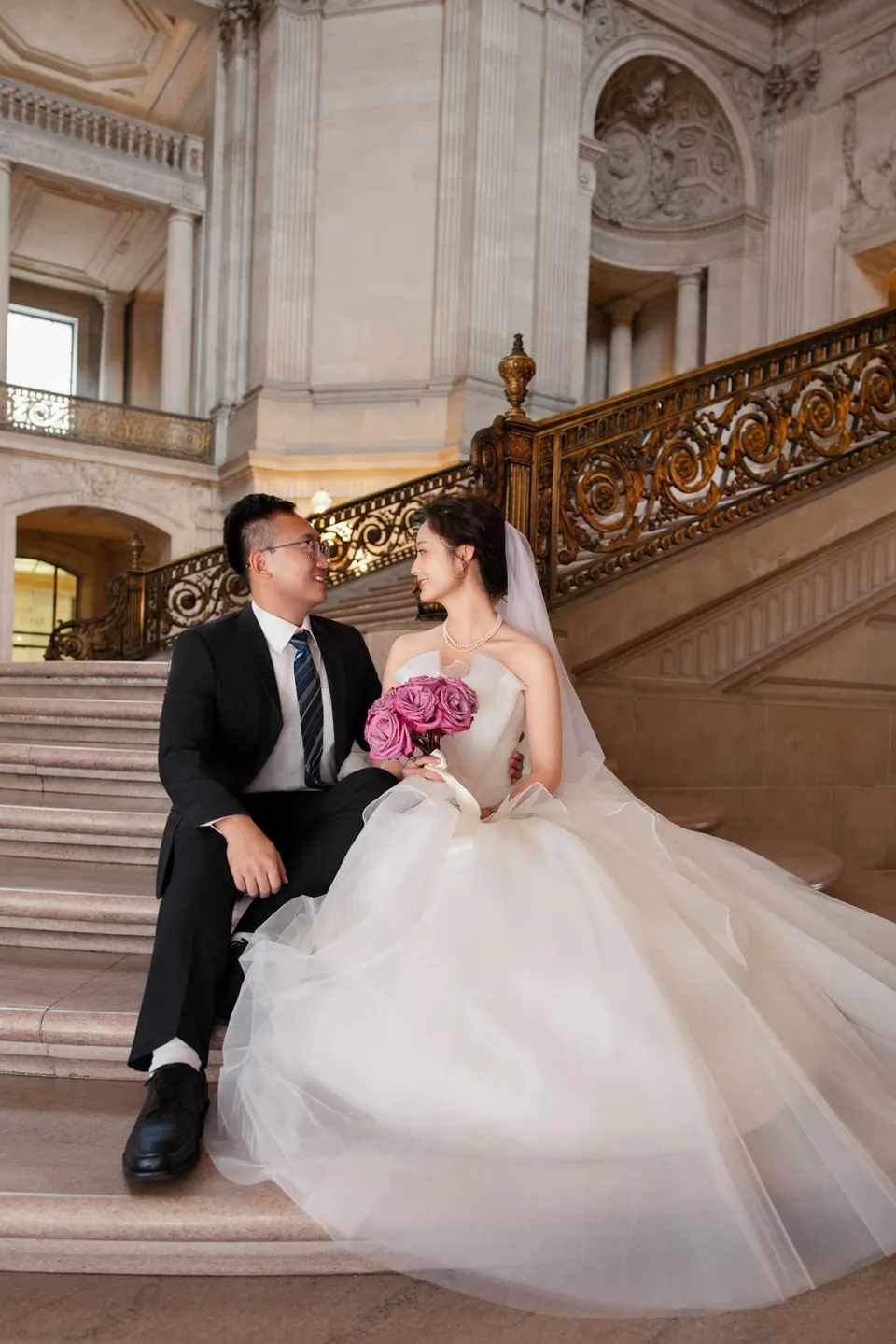 City Hall wedding with a ball gown and pink roses, frame 3 of 24