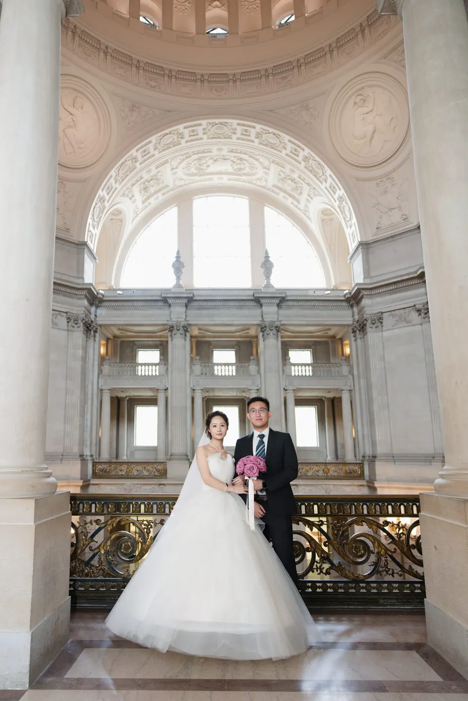 City Hall wedding with a ball gown and pink roses, frame 10 of 24