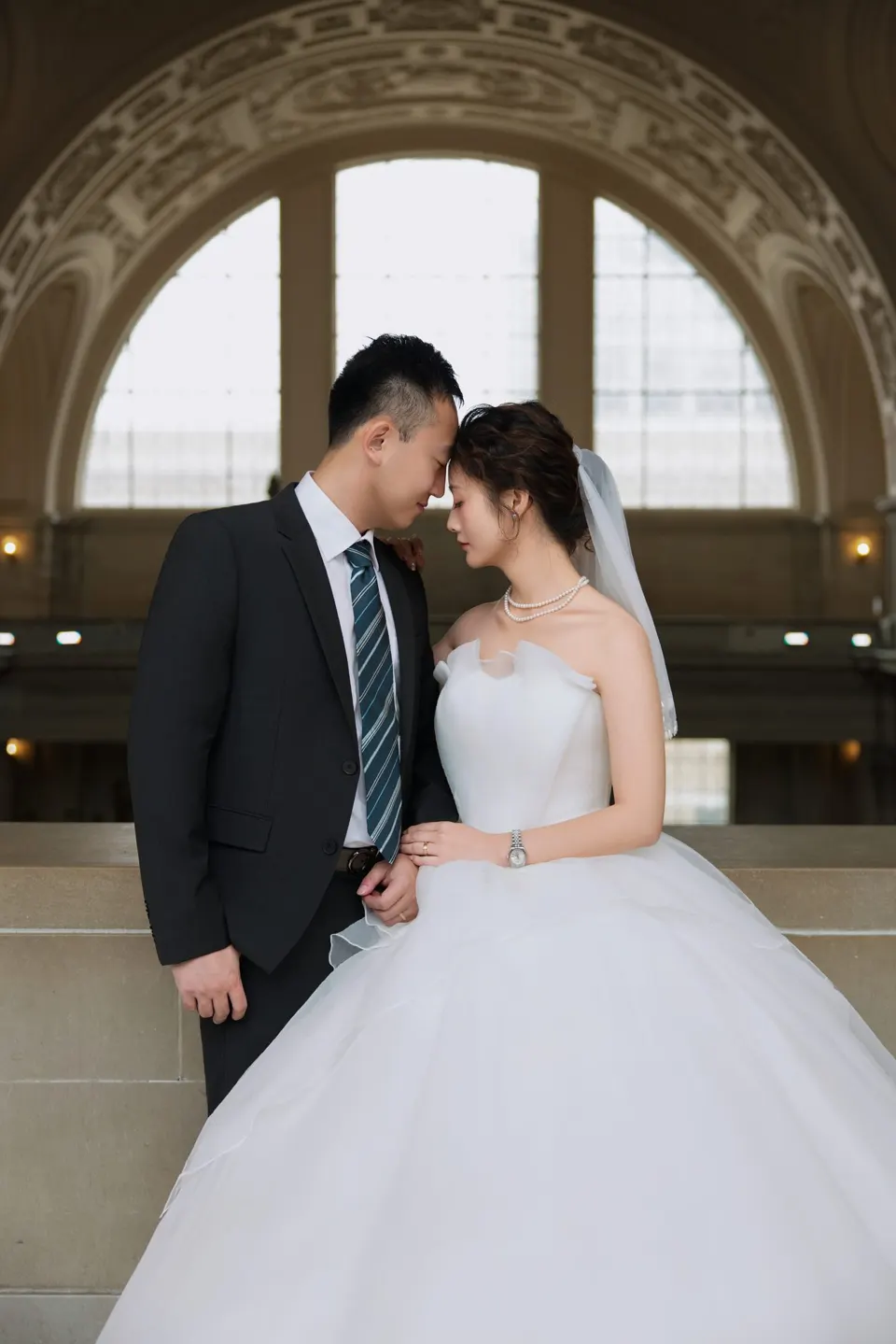 City Hall wedding with a ball gown and pink roses, frame 20 of 24