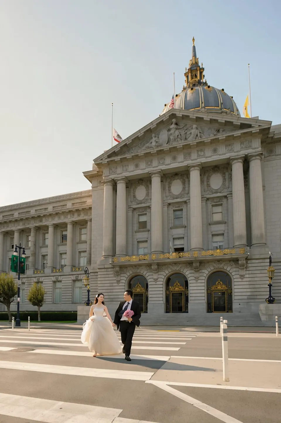 City Hall wedding with a ball gown and pink roses, frame 24 of 24