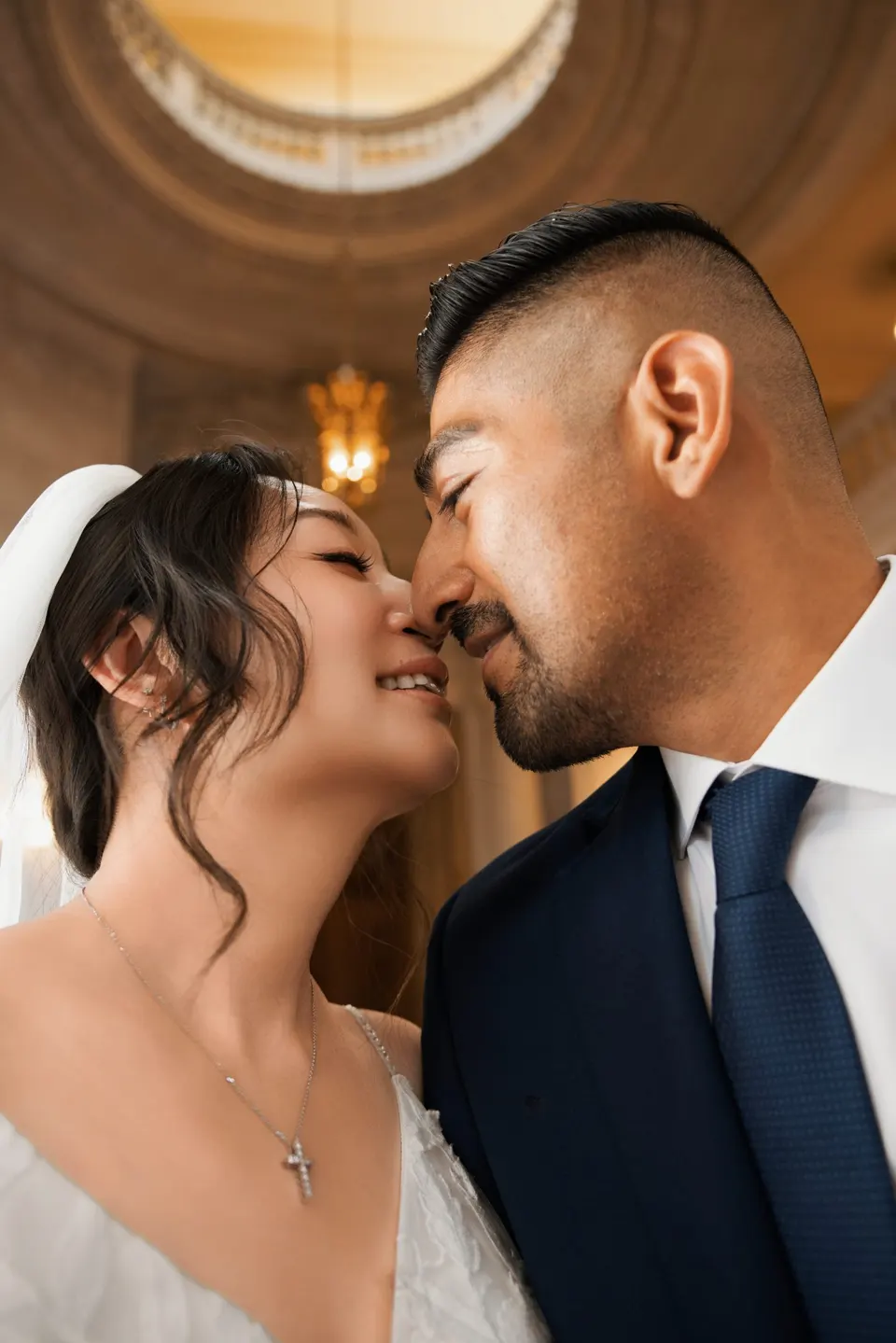City Hall wedding in window light, frame 14 of 33