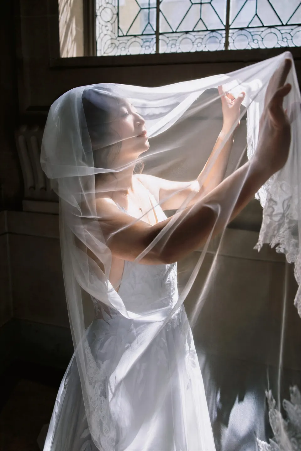 City Hall wedding in window light, frame 16 of 33