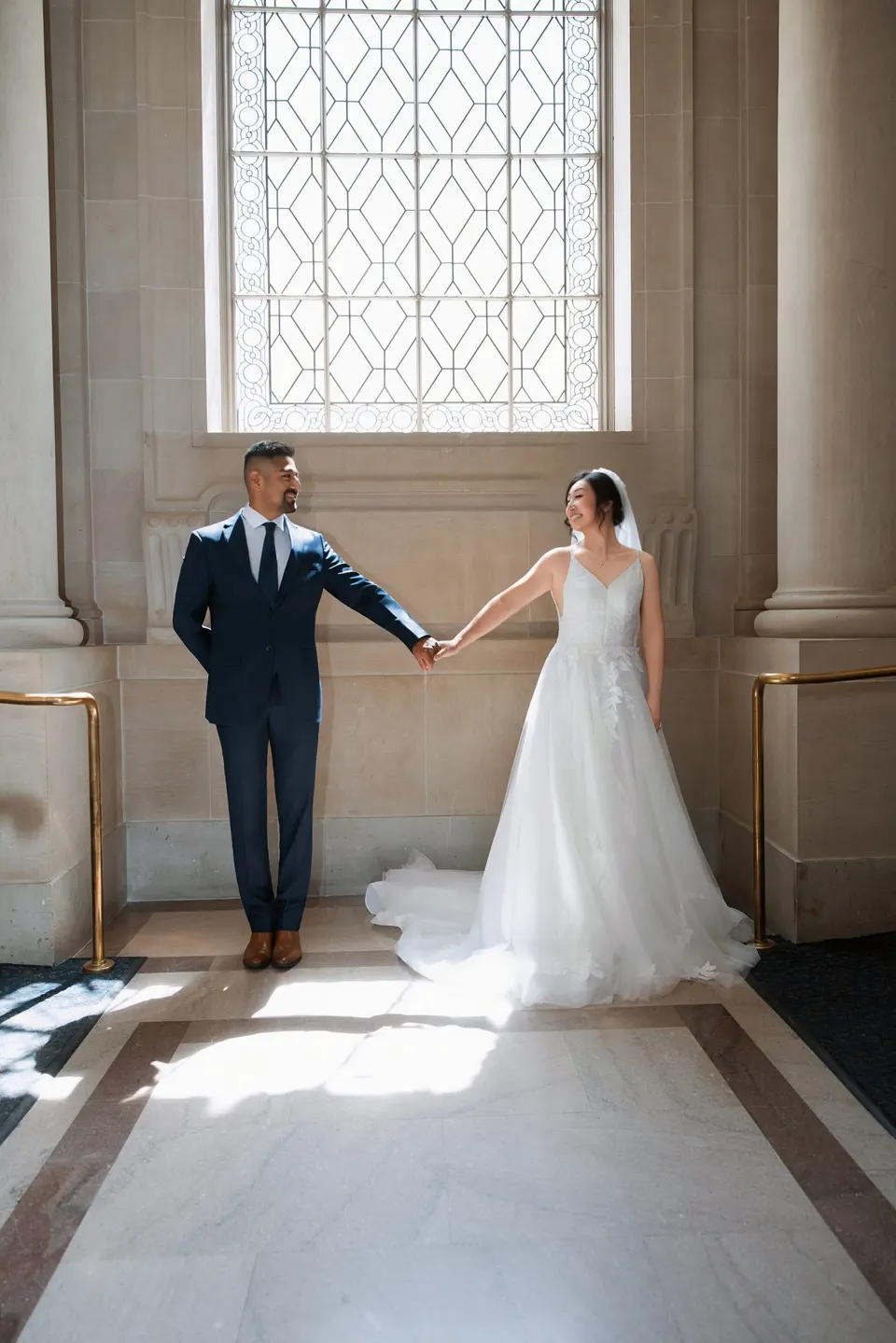 City Hall wedding in window light, frame 17 of 33