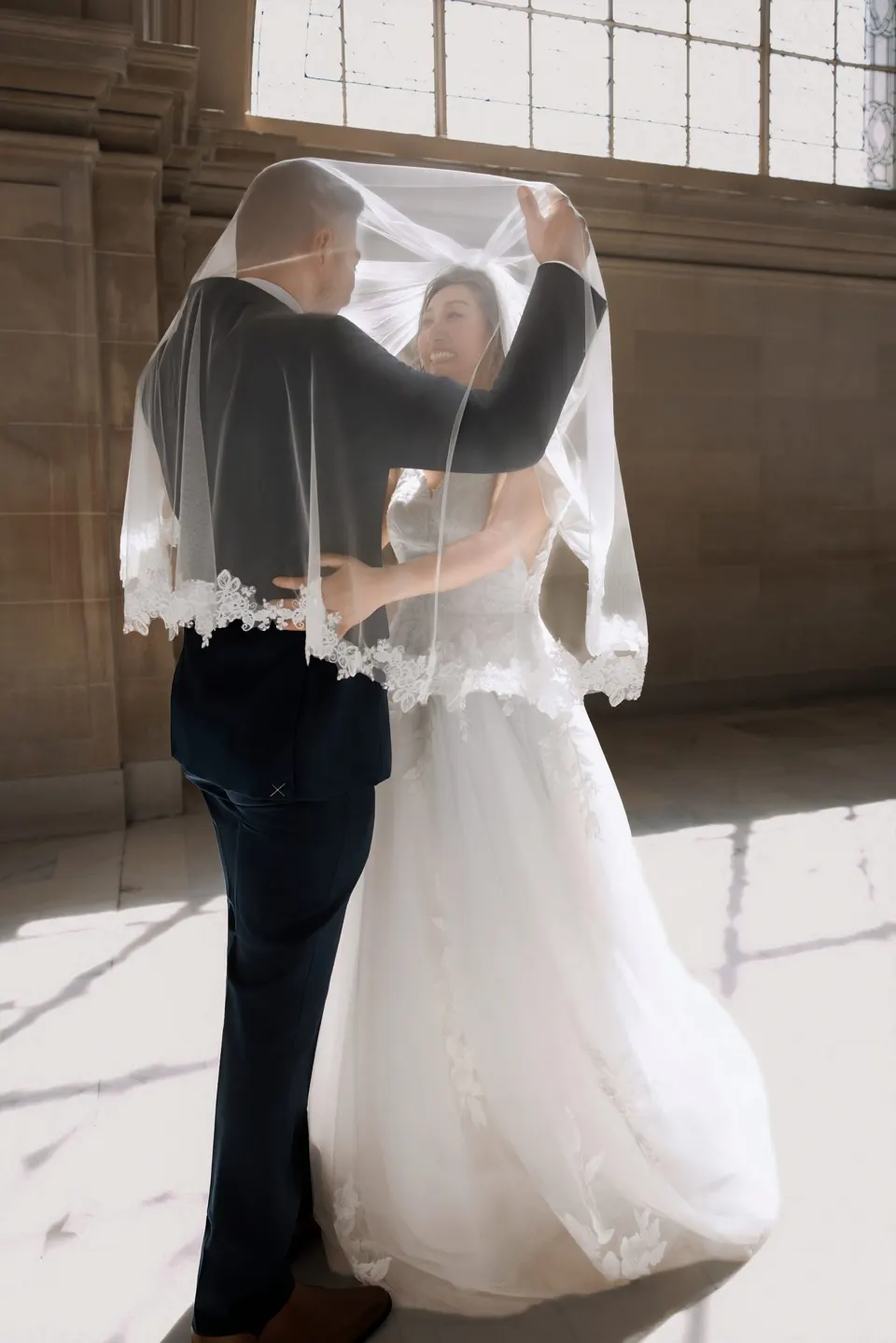 City Hall wedding in window light, frame 27 of 33