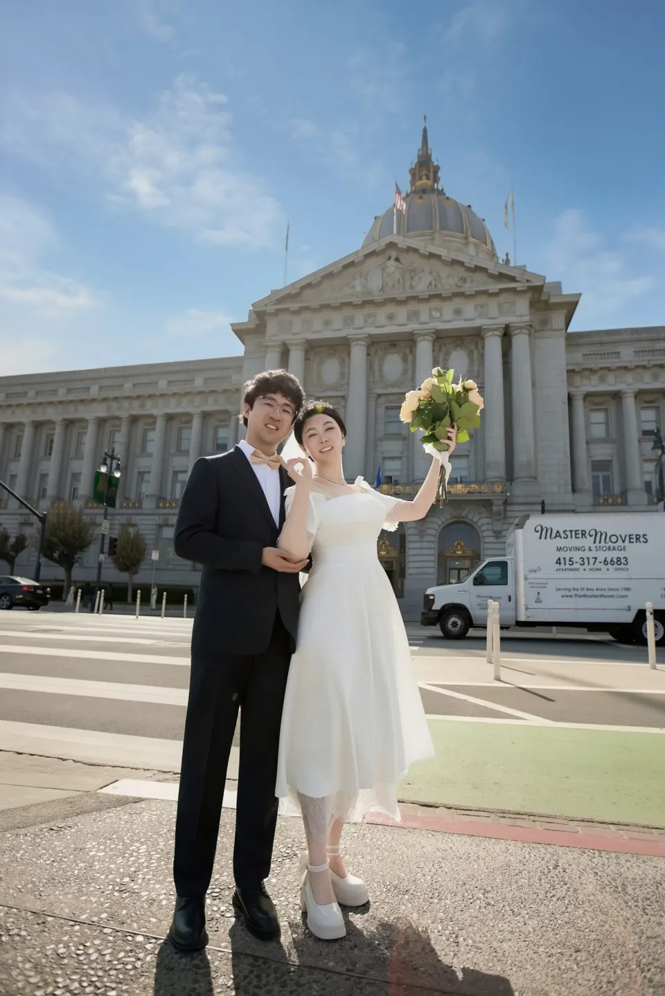City Hall wedding with yellow roses, frame 41 of 41