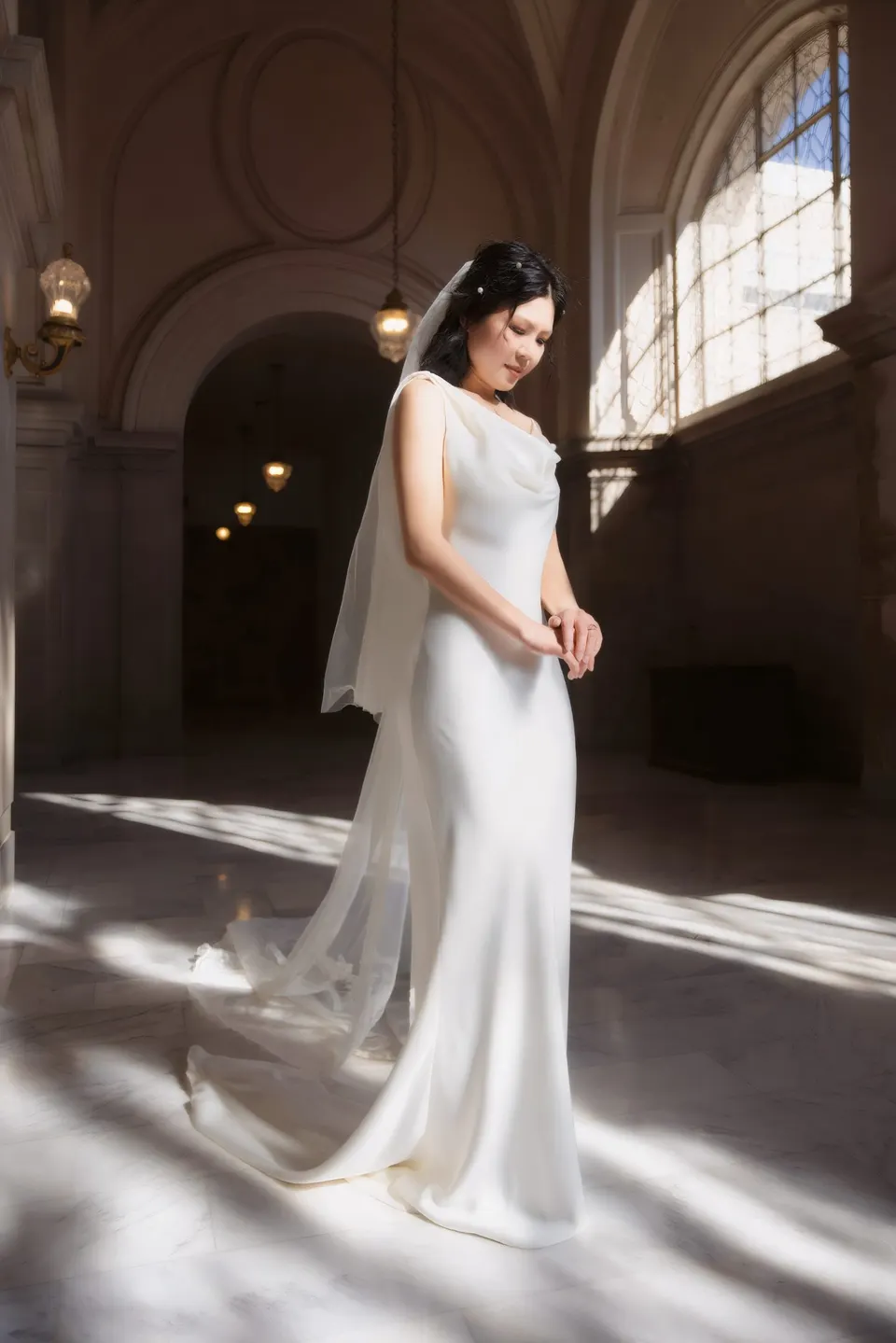 City Hall wedding with calla lilies and a long lace veil, frame 17 of 25