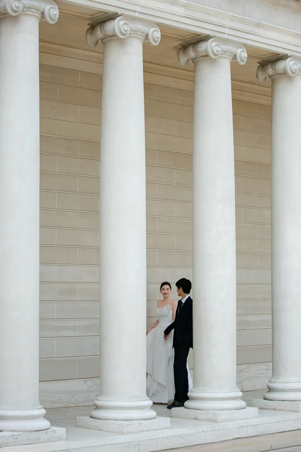 Couple in the courtyard of the Legion of Honor, frame 5 of 7