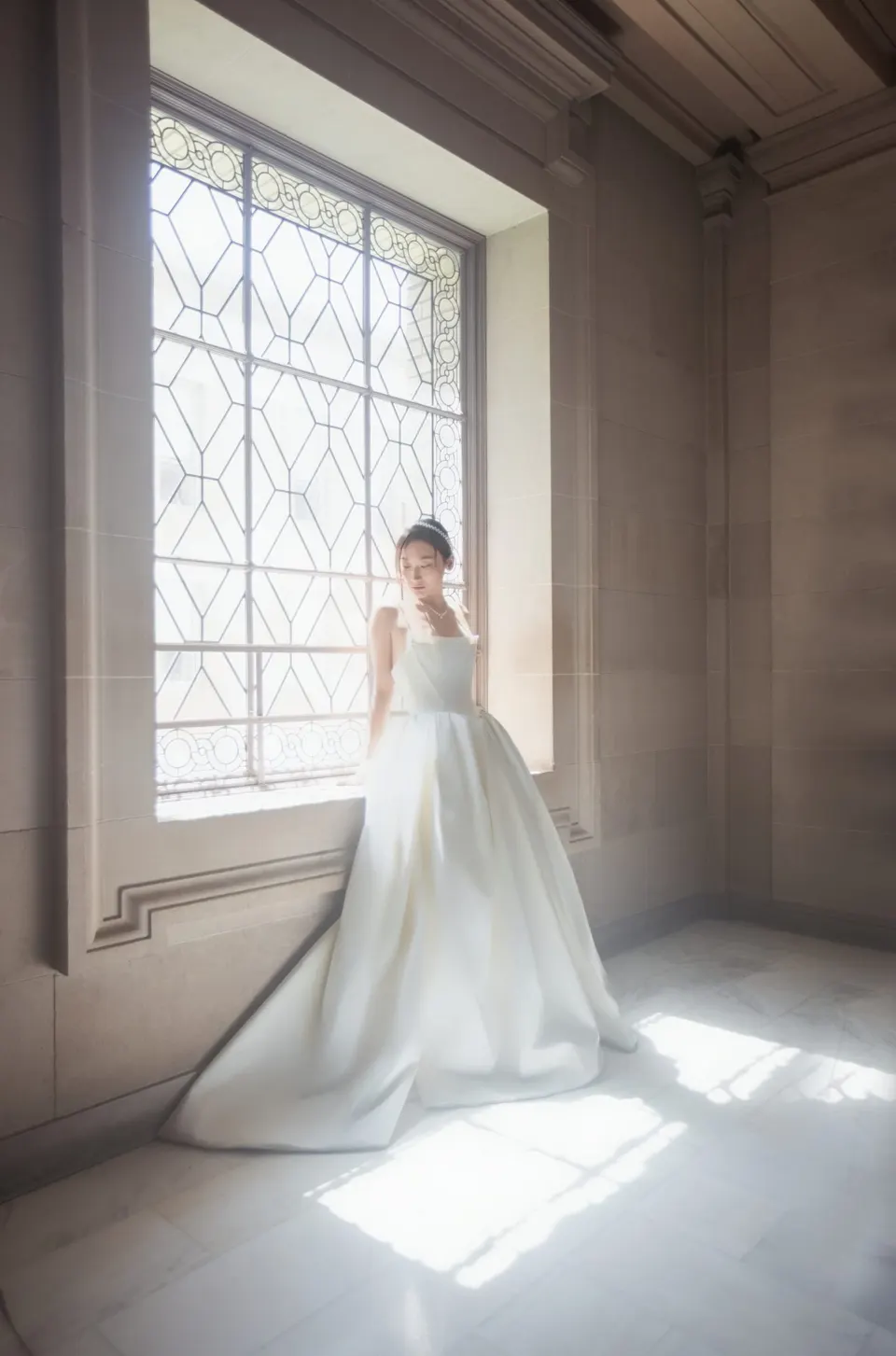 City Hall wedding in window light, frame 10 of 17